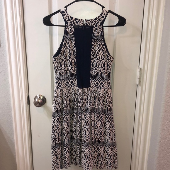 A navy dress w/ white embroidery and a sheer back - Picture 3 of 5